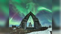 Aurora over arctic henge looks like a dragon.