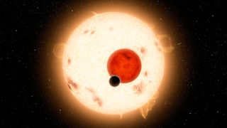 An artist's rendering of Kepler 16-b and its two suns